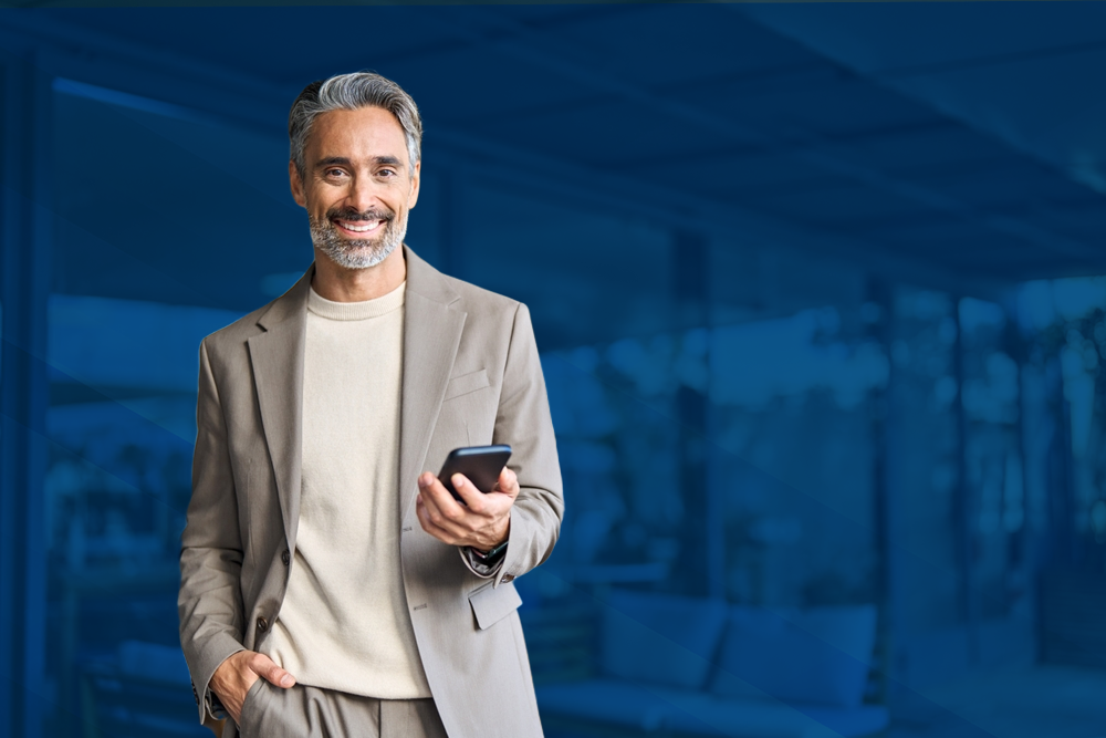 happy,mature,older,business,man,entrepreneur,wearing,suit,using,mobile